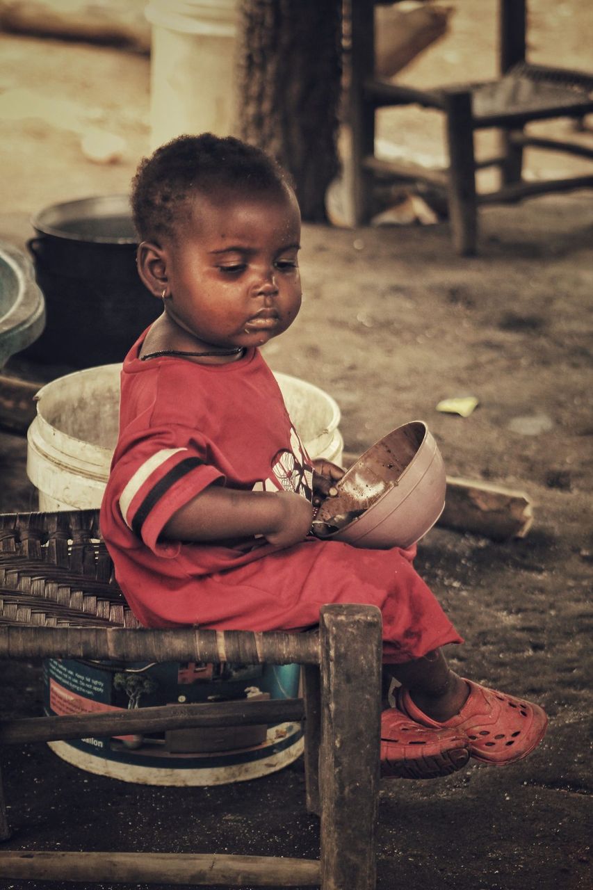 A young child in the Democratic Republic of Congo, the reality that inspired AILE Foundation