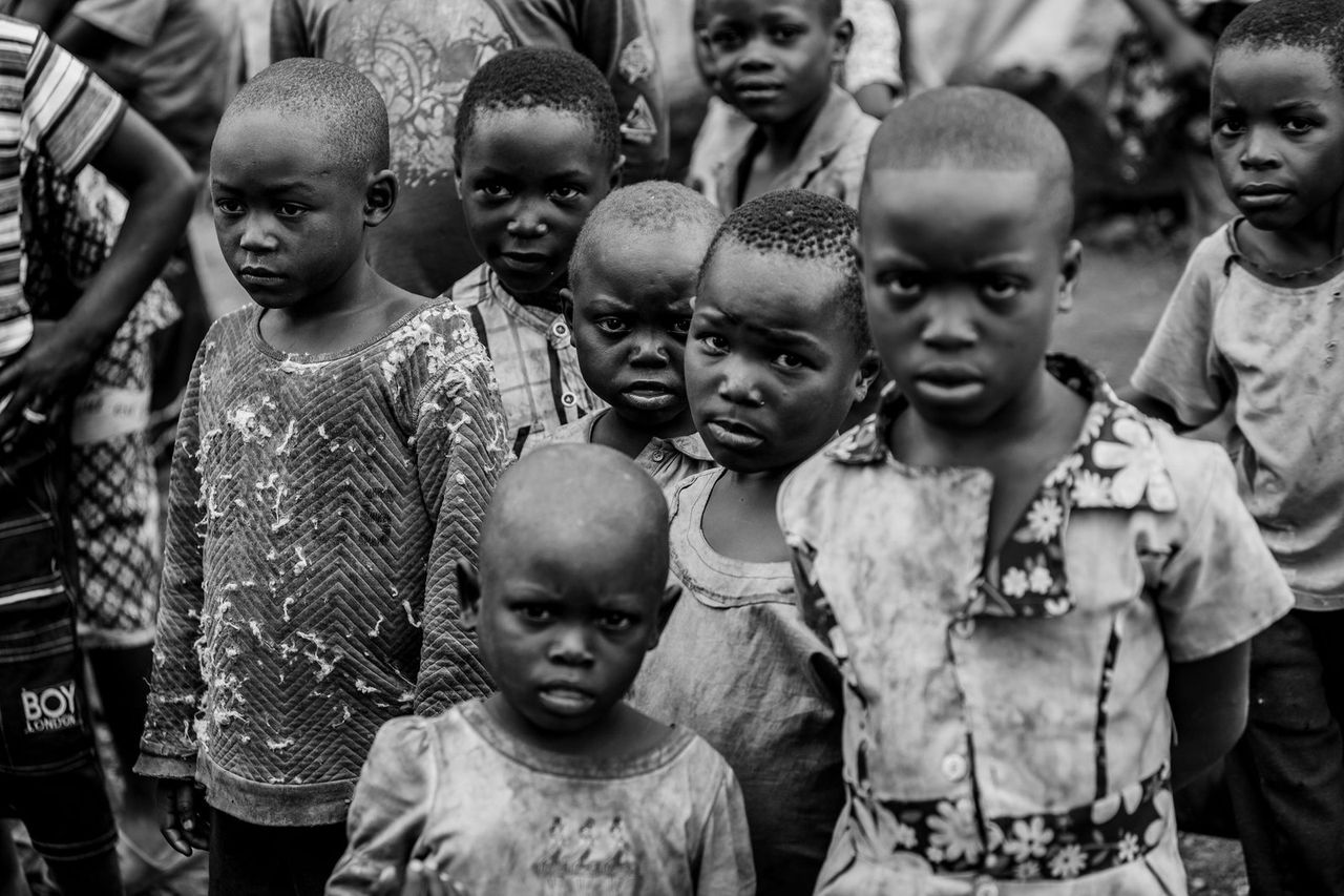 Young people gathered together in a mentorship and leadership program in the DRC